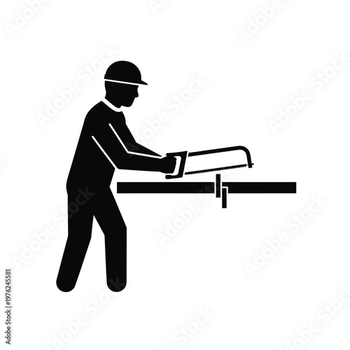 Silhouette of a man sitting with a laptop