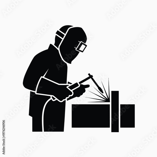 Silhouette of a man with laptop and gun sitting at desk