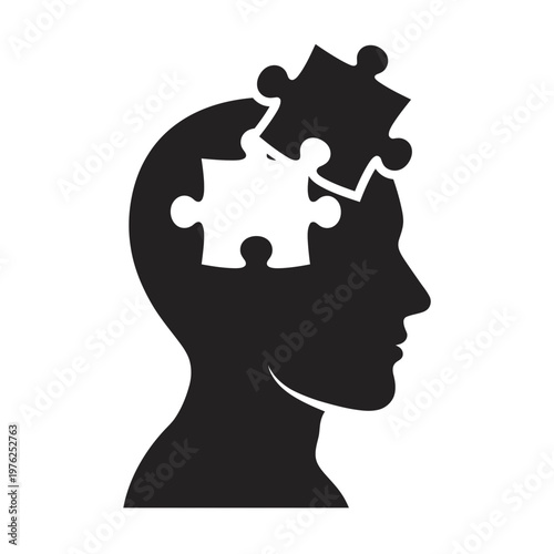 Silhouette of a head with puzzle pieces fitting in