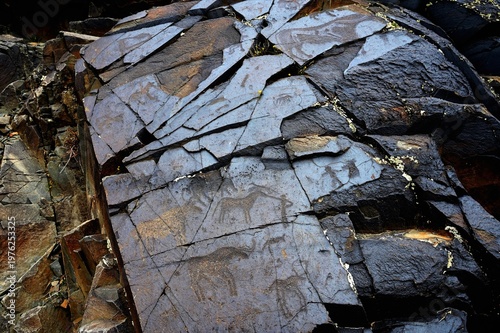 Bulls, goats, horses, people. Ancient rock carvings - Petroglyphs of Tanbaly,
Almaty Region, Zhambyl District, Matibulak Rural District District, Matibulak Rural District