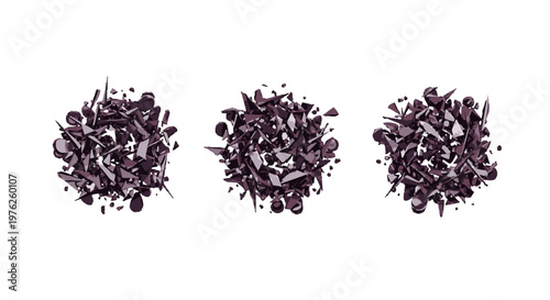 Three piles of dark purple flower petals.