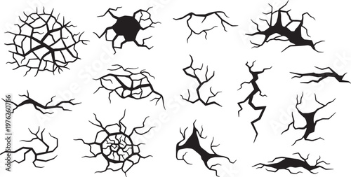 black cracks and breaks in ground  cracked earth and wall damages