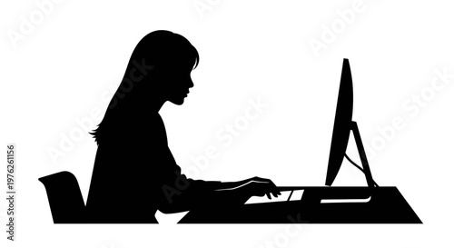 Silhouette of a Woman Working on a Computer at Her Desk with Keyboard and Monitor