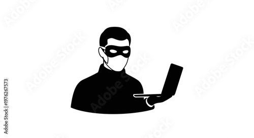 Hacker Wearing Mask Stealing Data From Laptop Computer Screen in Black and White