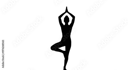 Silhouette of a woman in tree pose a yoga asana.