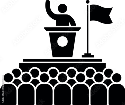 Person speaking at a public gathering with an audience