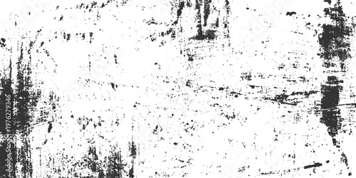 Black ink splatters and streaks on a white textured background grunge abstract