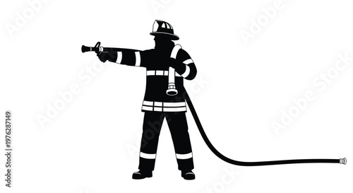 A firefighter directs a hose in a striking black silhouette