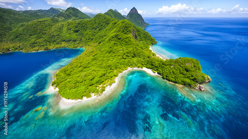 Aerial view of lush tropical island with turquoise lagoon white sandy beaches and deep blue ocean under clear sky