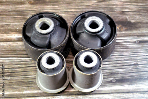 a set of lower control arm bushings for a vehicle, critical suspension components that act as vibration isolators between the control arm and the vehicle chassis