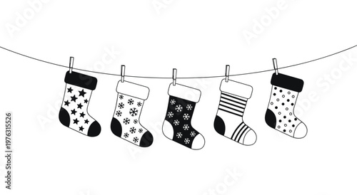 Set of five different christmas socks hanging on rope with clothespins, winter holiday celebration symbols, black and white outline vector, decorative patterns for winter season.