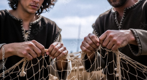 Two men in ancient attire mending a fishing net. Biblical depiction of the disciples James and John as fishermen. Historical religious scene of manual labor by the sea
