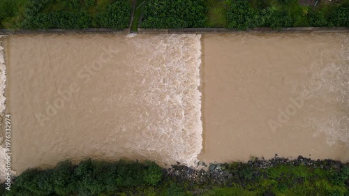 Footage of water structures built to prevent damage to the environment from floods that may occur after rain and storms.