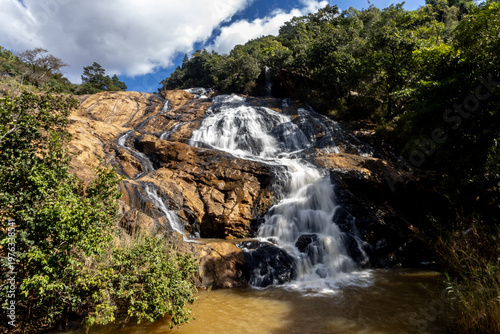 The impressive Phophonyane Falls, cascading down the ancient archaean gneiss, in the Piggs Peak region in North-western Eswatini.