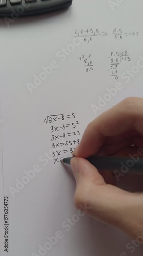 A student doing math. Close up.