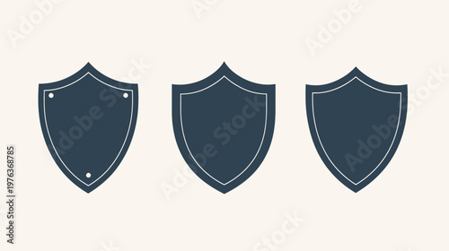 Three stylized shields in varying degrees of detail, dark blue on a cream background
