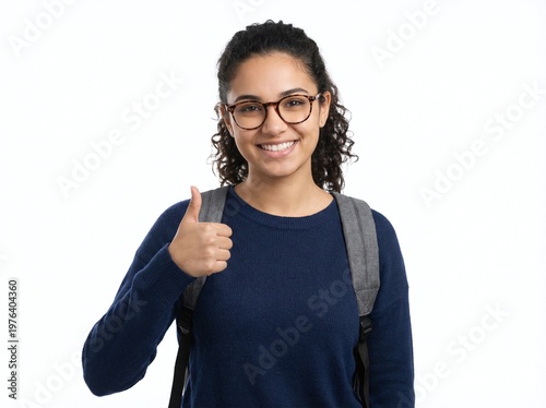 smiling student giving a thumbs-up 