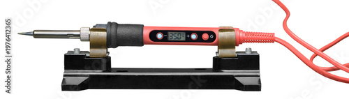 Red electric soldering iron on a stand