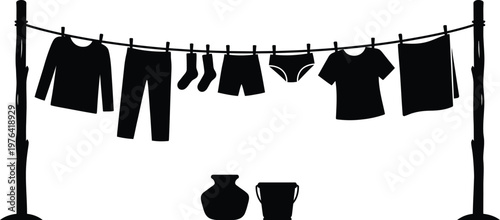 Clothes hanging on a clothesline with two pots below on white background Keywords: laundry, clothesline
