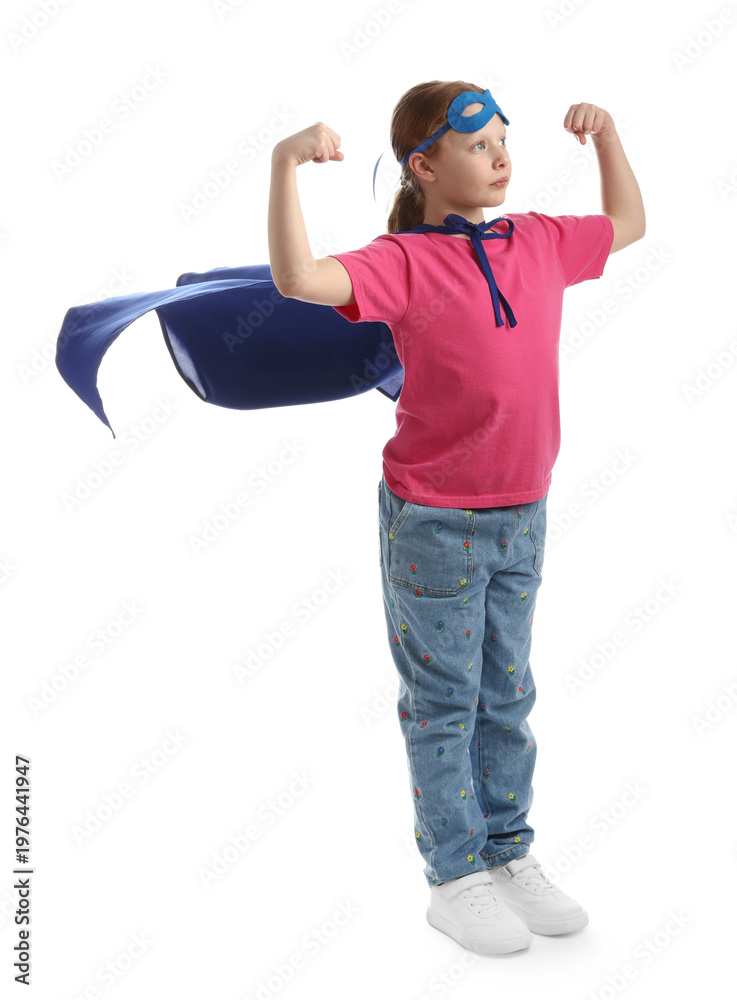 Fototapeta premium Little girl wearing superhero costume on white background