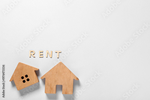 Wooden houses and word RENT...