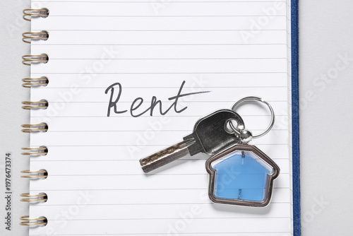 Notebook with word RENT and...