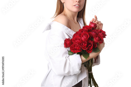 Young woman with bouquet of beautiful red rose flowers on white background