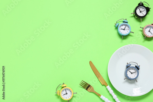 Plate with cutlery and alar...