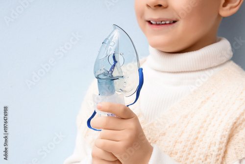 Cute little boy with nebuli...