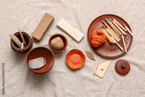 Sculptor tools, clay and bo...