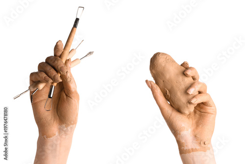 Female hands with clay and ...