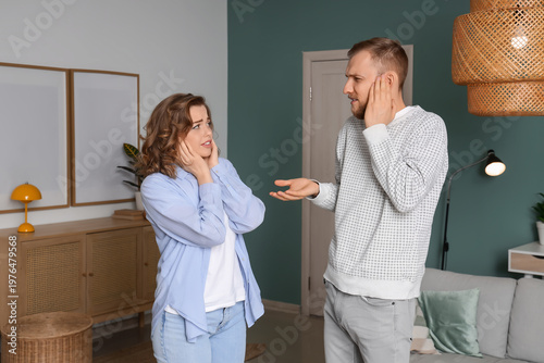 Young couple suffering from...