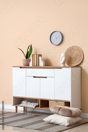 Chest of drawers with books...
