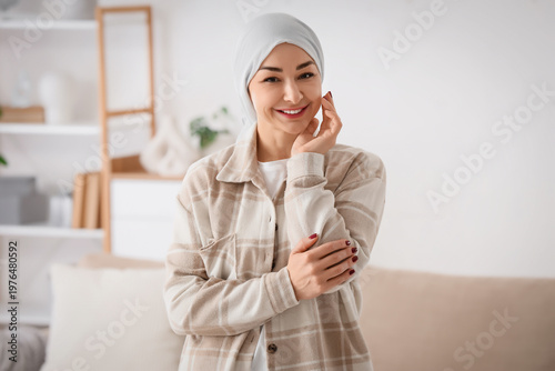 Young woman after chemotherapy at home. Brain cancer concept