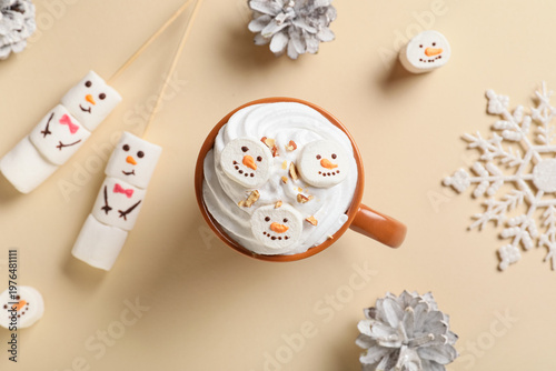 Cup with snowmen made of ta...