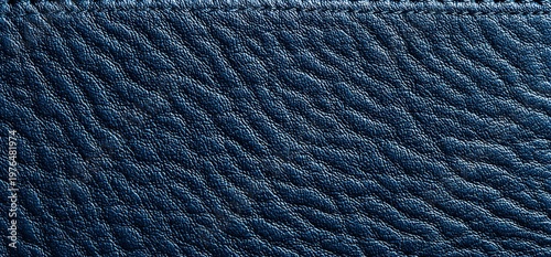 Deep Blue Textured Leather Background with Subtle Grain Detail.