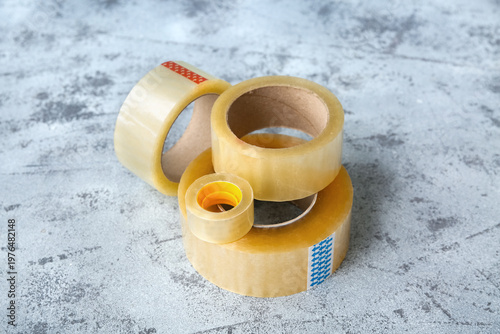 Adhesive tape rolls on grun...