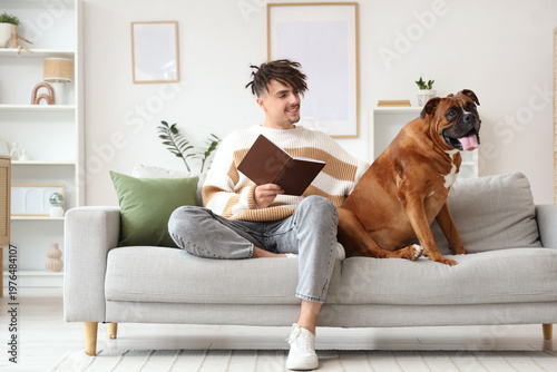 Young man with book and Box...