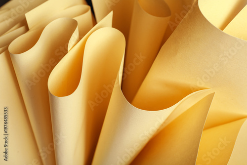 Twisted sheets of yellow pa...