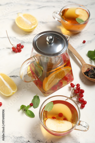 Glass teapot and cup of tas...