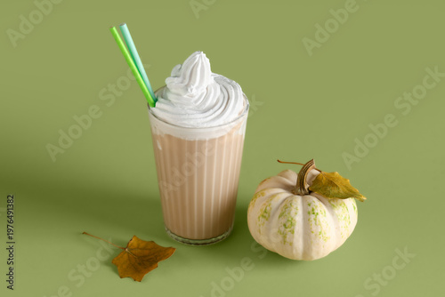 Glass of hot pumpkin latte ...