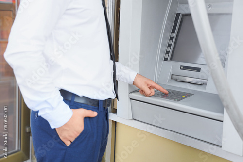 Businessman entering card's...
