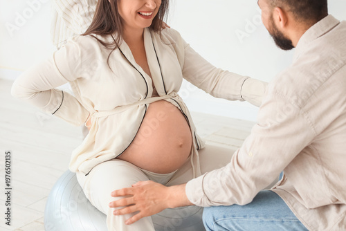 Young happy pregnant woman ...