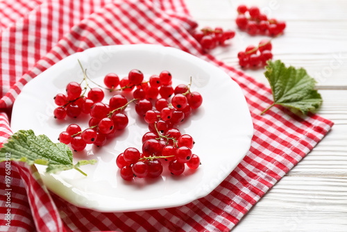 Plate with fresh red curran...