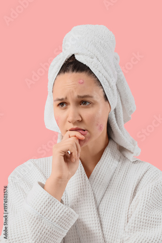 Stressed young woman in bat...