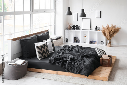 Interior of bedroom with sh...