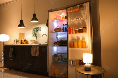 Open fridge full of differe...