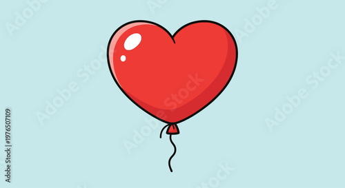 Red heart shaped rubber balloon floating.