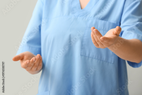 Female doctor gesticulating...