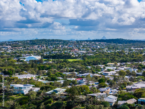 Panoramic View of a Lush Coastal Town on the Sunshine Coast, Queensland, with Glass House Mountains in the Distance
